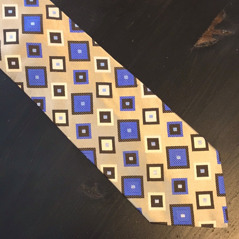 Blue and gold diamond patterned necktie